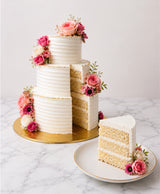 Four-Tier Ivory & Gold Cascade Floral Wedding Cake