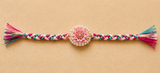 Pastel Pink Floral Braided Designer Rakhi