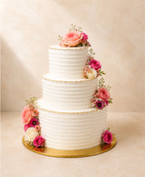 Four-Tier Ivory & Gold Cascade Floral Wedding Cake