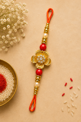 Golden Floral Designer Rakhi with Pearl & Red Beads
