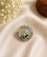 Elegant Floral Pearl Stud Earrings with Green Enamel Detailing