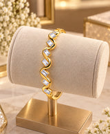 Golden Wave Crystal Bangle – Elegant Rectangular Stone Bracelet