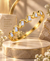 Golden Wave Crystal Bangle – Elegant Rectangular Stone Bracelet