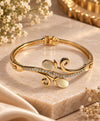 Elegant Gold-Tone Cat’s Eye Crystal Cuff Bracelet