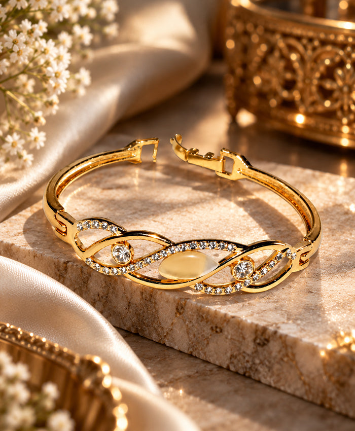 Elegant Gold-Tone Crystal Studded Open Bangle – Infinity-Inspired Statement Bracelet