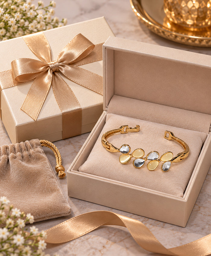 Elegant Gold-Tone Cuff Bracelet with Teardrop Stone Detailing