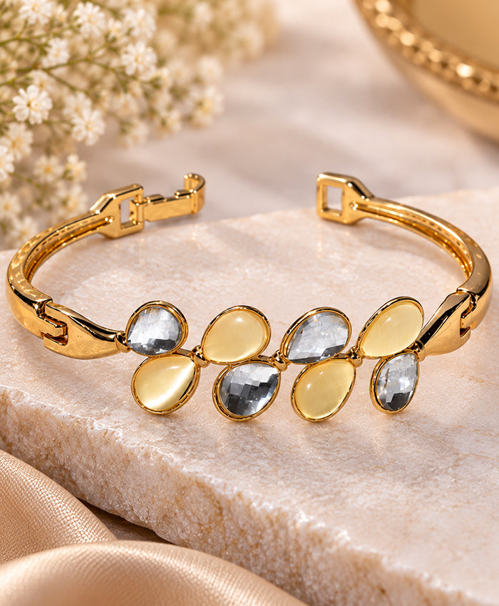 Elegant Gold-Tone Cuff Bracelet with Teardrop Stone Detailing