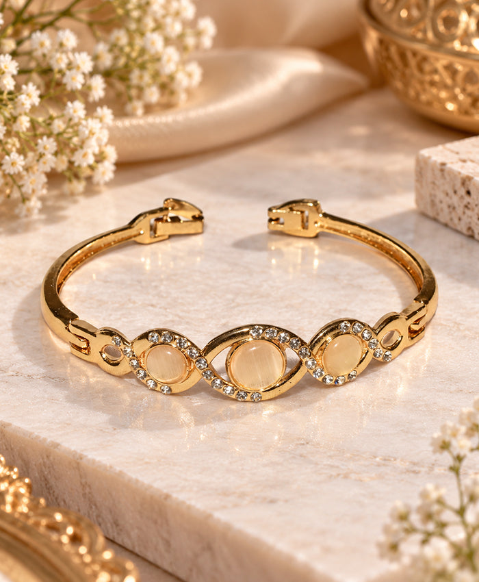 Elegant Gold-Tone Triple Oval Crystal Bangle – Champagne Stone Statement Bracelet for Women