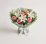 Elegant Pink Roses, White Lilies & Birthday Cake Combo