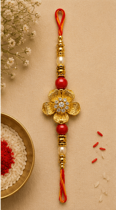 Golden Floral Designer Rakhi with Pearl & Red Beads