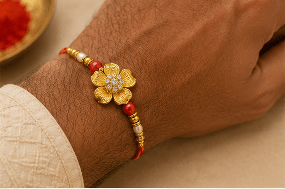 Golden Floral Designer Rakhi with Pearl & Red Beads