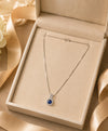 Elegant Blue Stone Halo Pendant Necklace for Women – Silver-Tone Statement Jewellery
