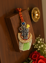 Premium Radha Krishna Designer Lumba Rakhi with Green Tassel