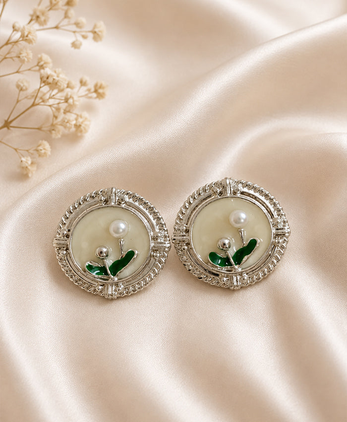 Elegant Floral Pearl Stud Earrings with Green Enamel Detailing