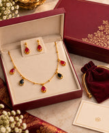 Elegant Gold-Toned Red & Black Teardrop Pendant Necklace