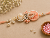 Elegant Peach Pearl Designer Rakhi Combo Set