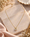 Elegant Gold Bow & Crystal Circle Pendant Necklace
