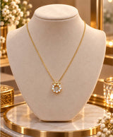 Elegant Gold Bow & Crystal Circle Pendant Necklace