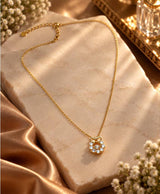 Elegant Gold Bow & Crystal Circle Pendant Necklace