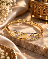 Elegant Gold-Tone Crystal Studded Open Bangle – Infinity-Inspired Statement Bracelet
