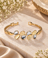 Elegant Gold-Tone Cuff Bracelet with Teardrop Stone Detailing