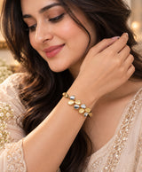 Elegant Gold-Tone Cuff Bracelet with Teardrop Stone Detailing