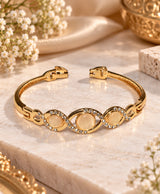 Elegant Gold-Tone Triple Oval Crystal Bangle – Champagne Stone Statement Bracelet for Women