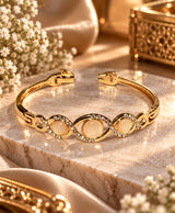 Elegant Gold-Tone Triple Oval Crystal Bangle – Champagne Stone Statement Bracelet for Women