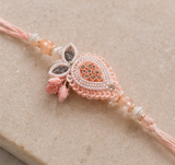 Elegant Peach Pearl Designer Rakhi Combo Set