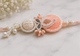 Elegant Peach Pearl Designer Rakhi Combo Set