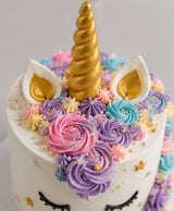 Golden Horn Floral Unicorn Cake