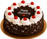 Red Roses, White Lilies & Black Forest Anniversary Celebration Combo